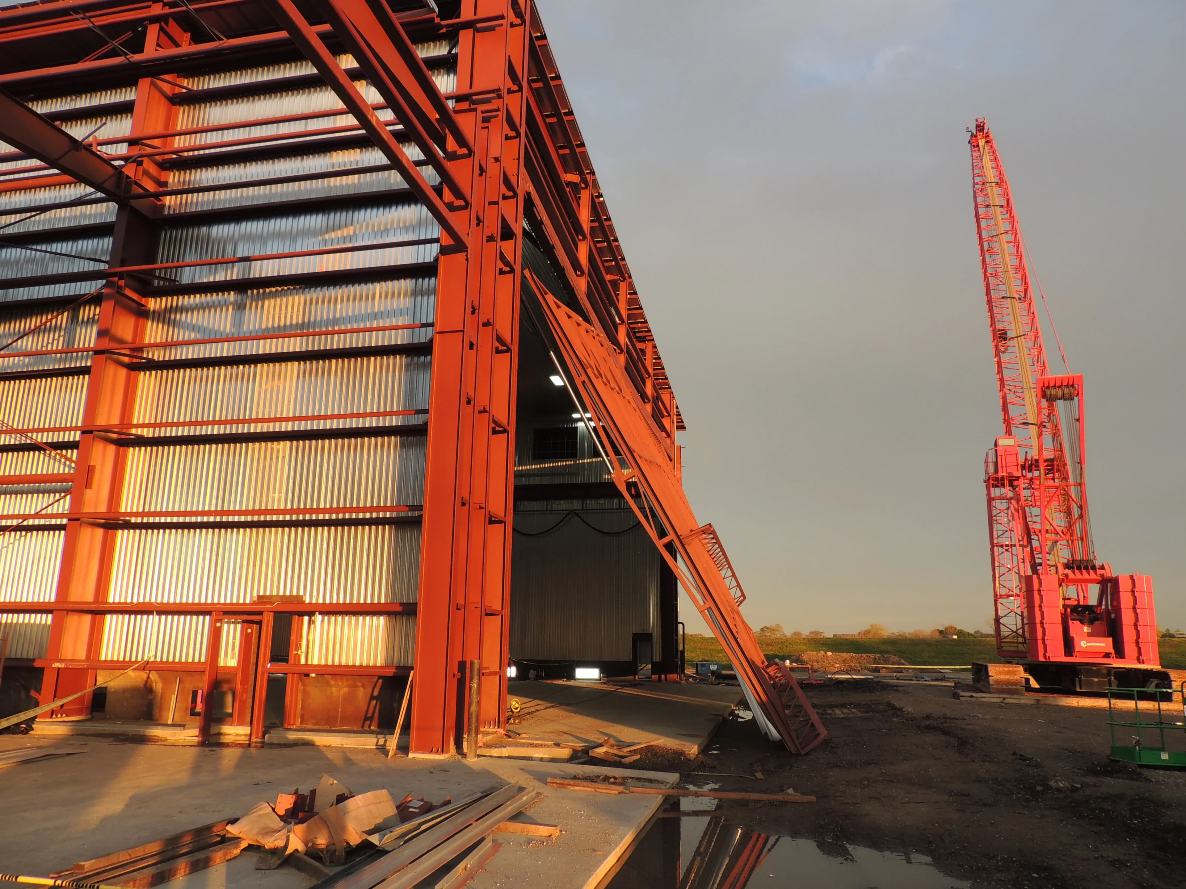 Overhead cranes in construction bay