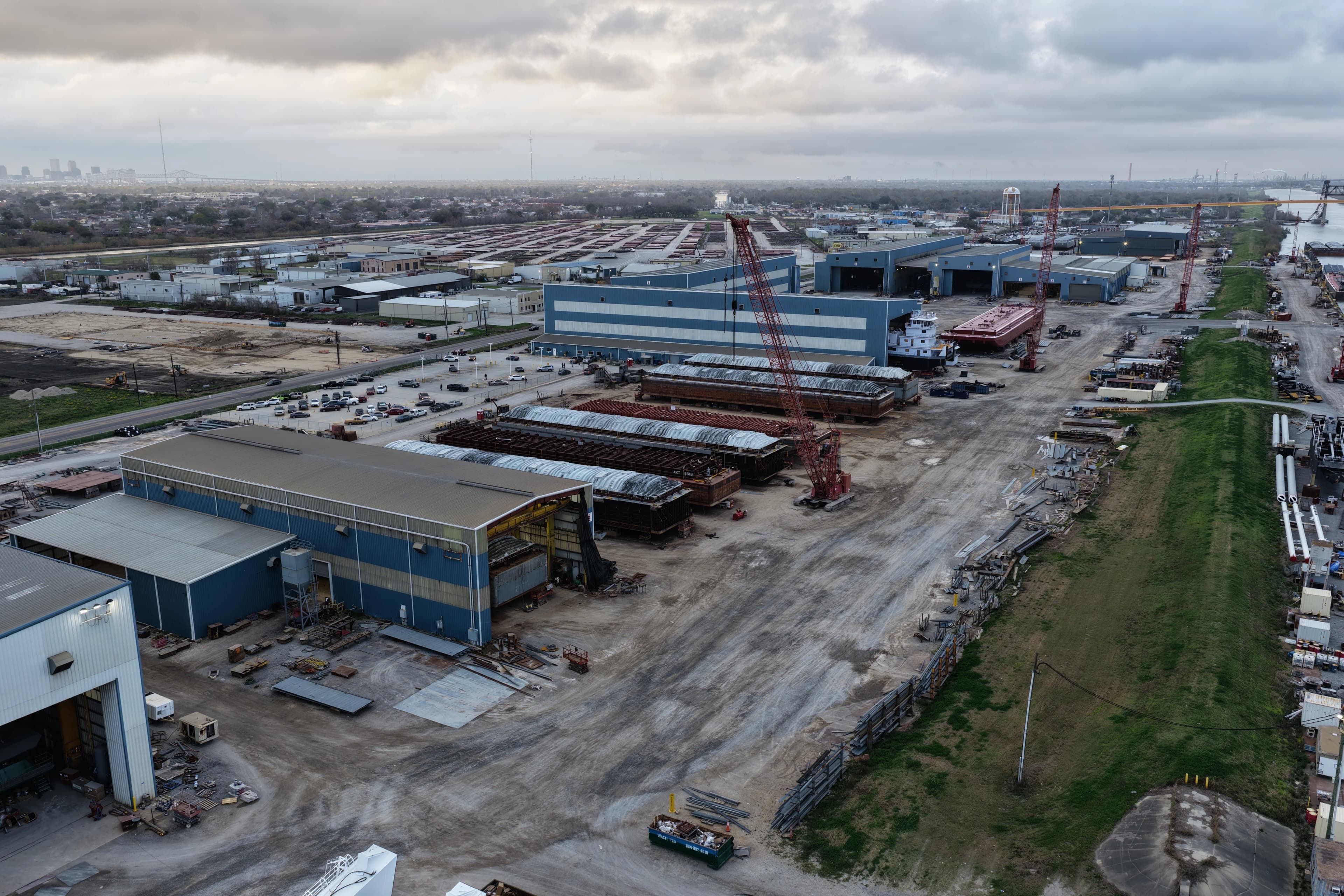 Aerial view of C&C Marine fabrication bays and crawler cranes
