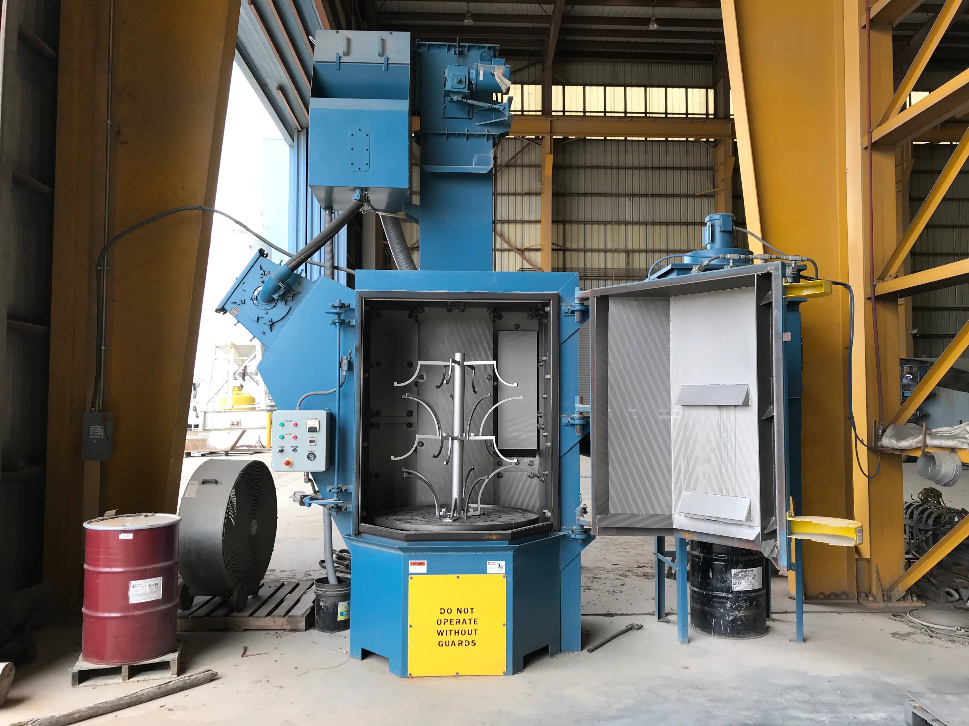 Robotic blast and paint facility